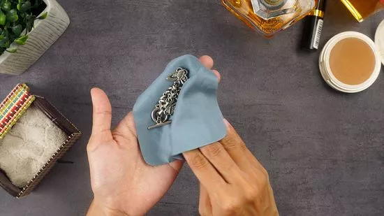 Wipe silver jewelry with a polishing cloth before putting it away.
