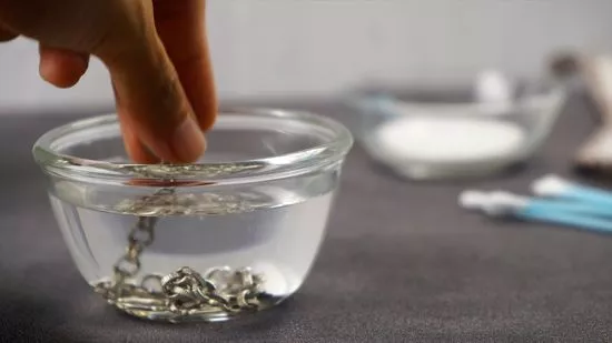 Dampen the silver with water to help spread toothpaste more evenly.