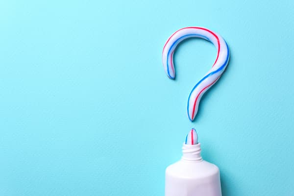 Toothpaste with question marks