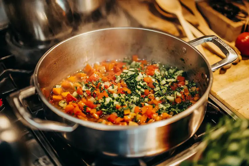 chopped vegetables being sautéed in sunflower oil