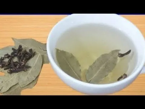 Preparing an infusion with bay leaves and cloves