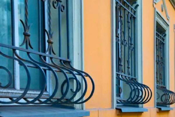 Curved wrought iron window bars