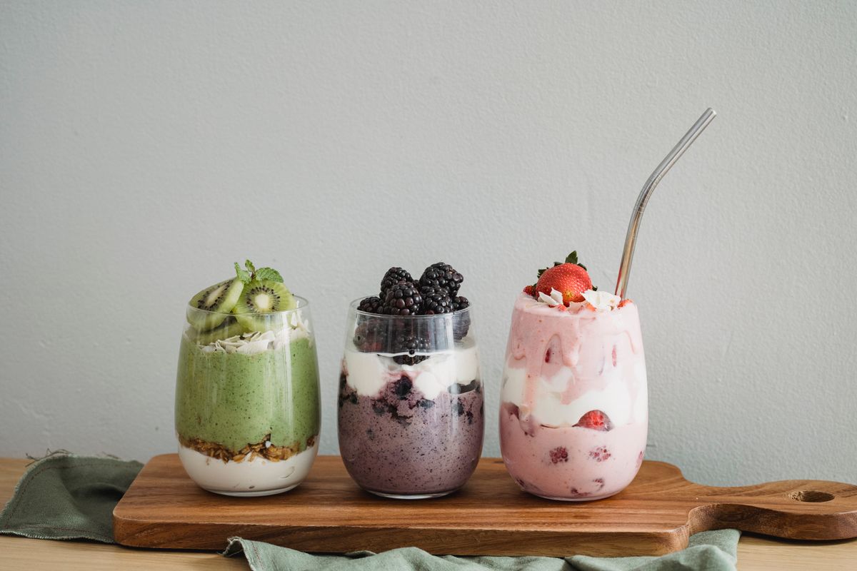 A purple blackberry smoothie in a glass
