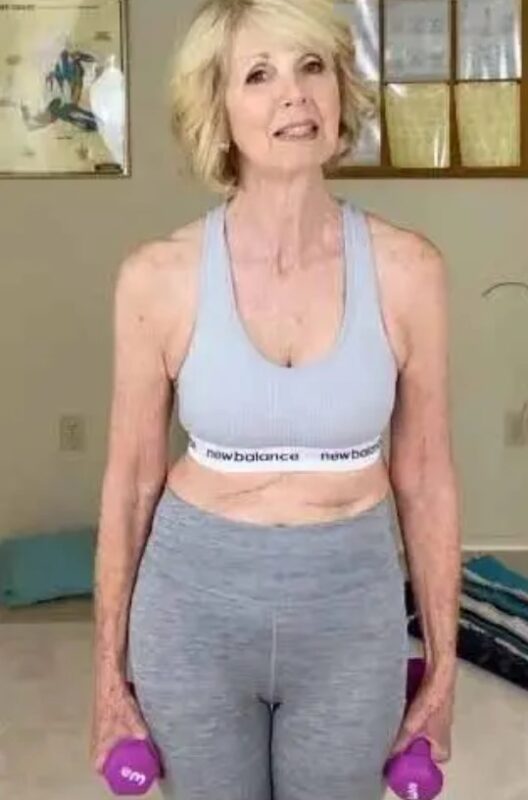 Older woman posing proudly
