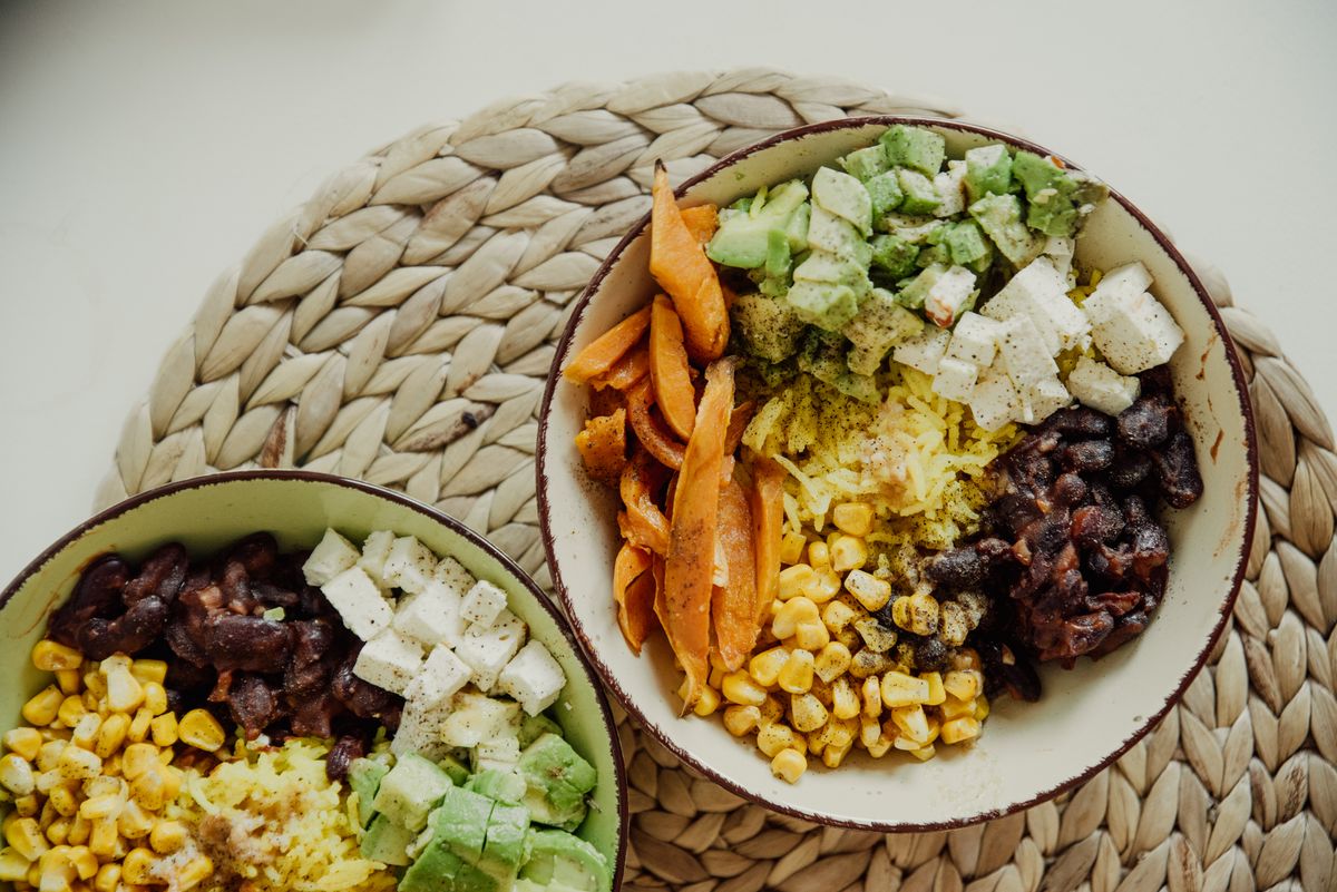 Colorful vegetable bowl with beetroot, greens, and grains