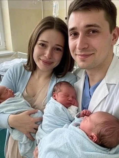 Mother with her triplets