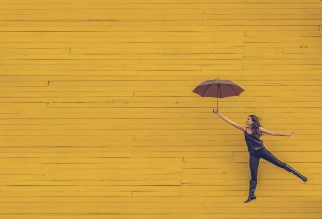 Missing umbrella on a bench