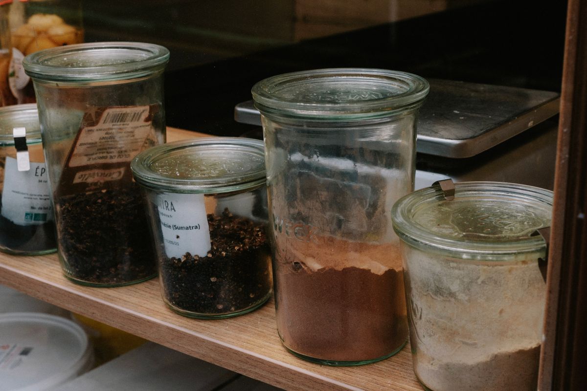 Small spice jars used for seasoning roasted pumpkin seeds