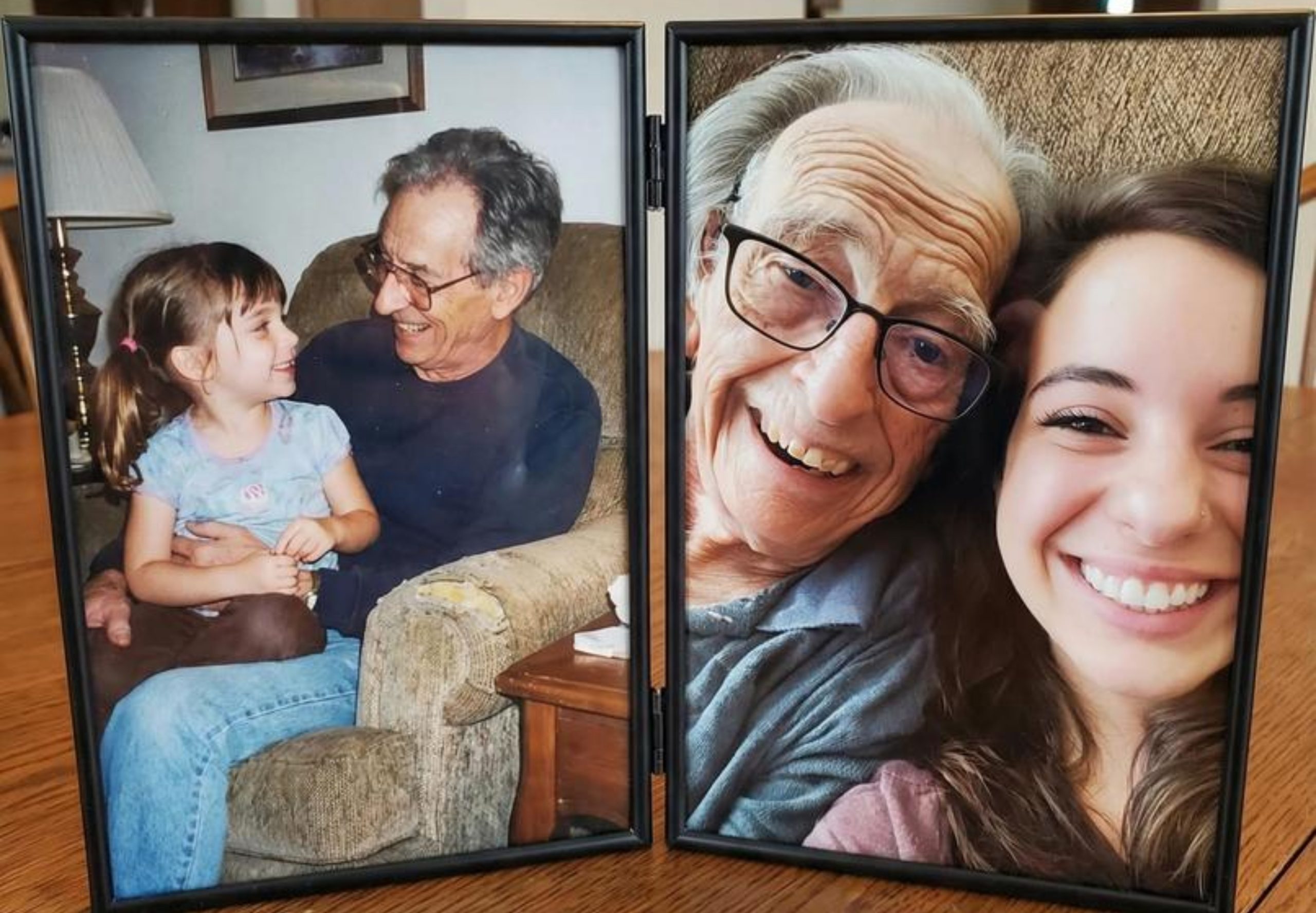 Grandfather and granddaughter in a living room