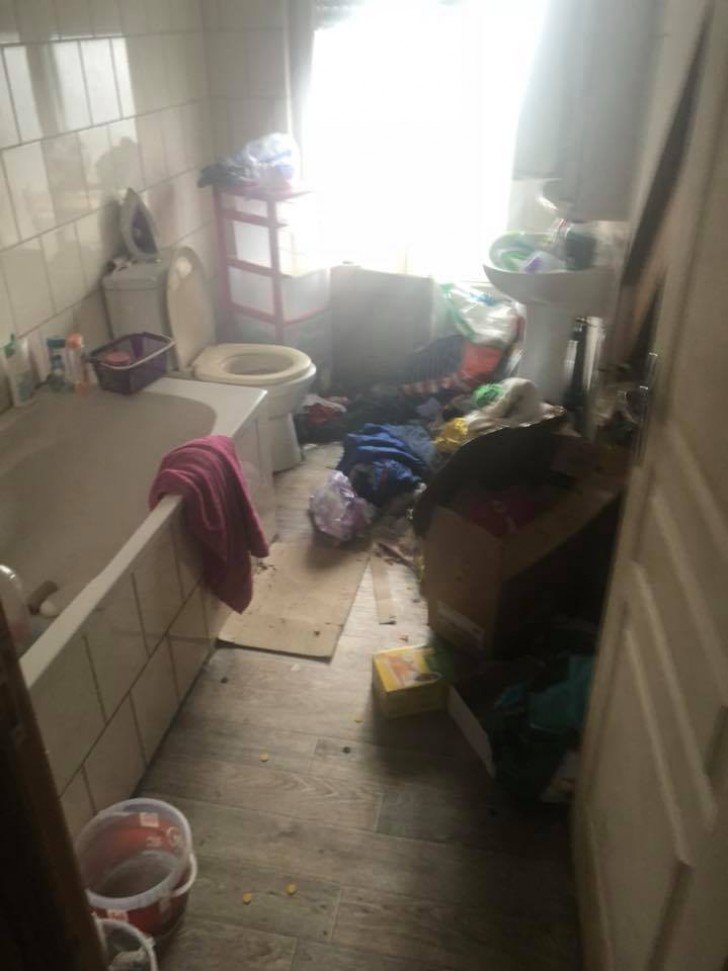 Trash in front of a door