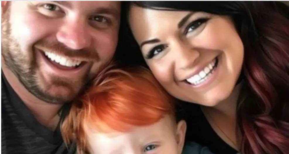 Family around a baby