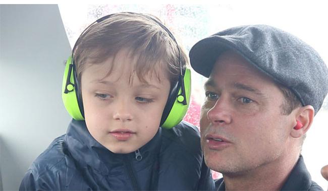 Knox Jolie-Pitt with his mother