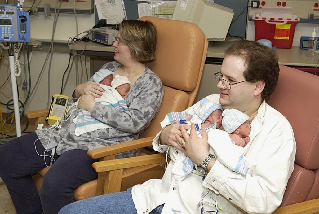 A father in skin-to-skin contact with his baby