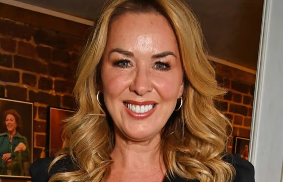 Claire Sweeney enjoying the sea with her son