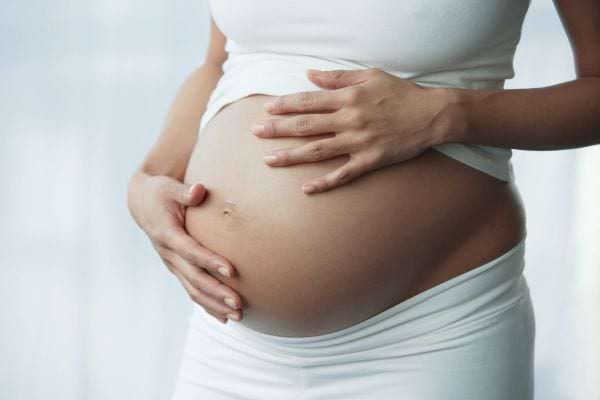 close-up of pregnant belly