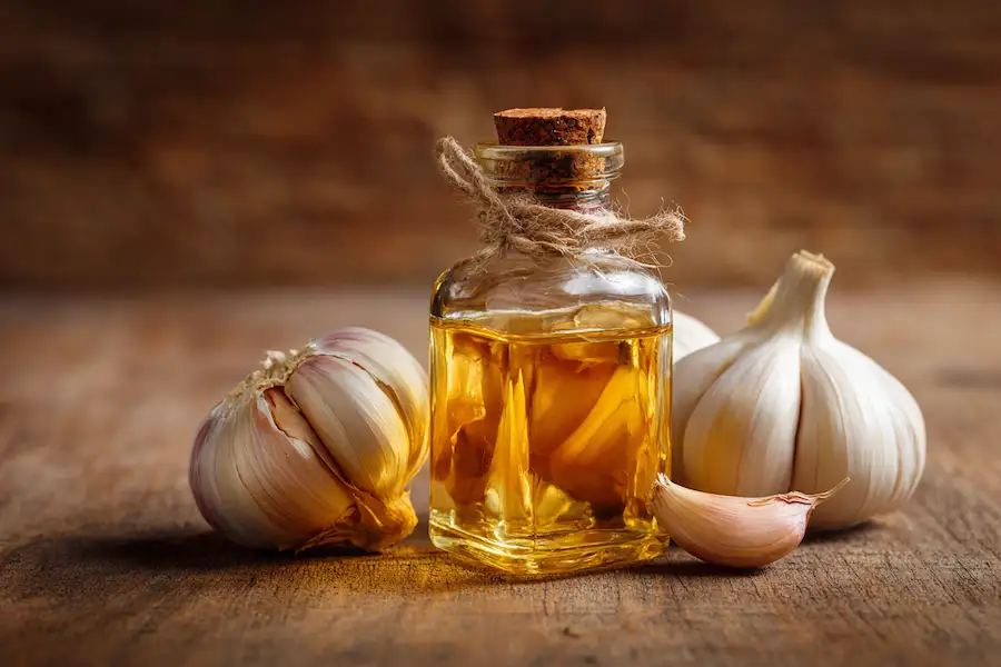close-up of garlic oil bottle