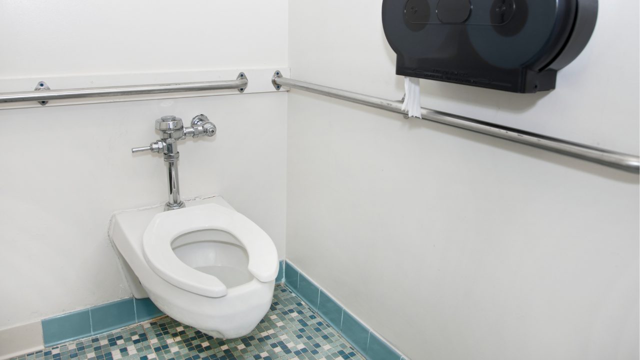 Women's restroom with open front space in the USA